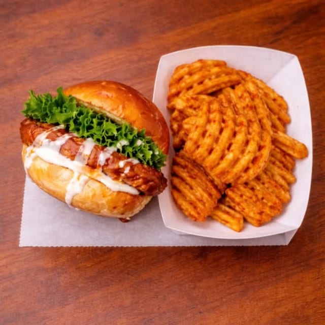 BUFFALO FRIED CHICKEN SANDWICH WITH FRIES.