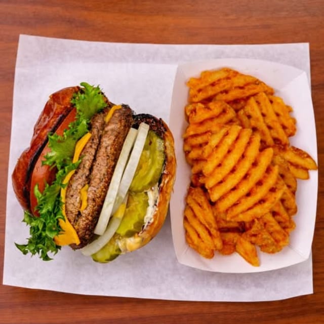 CHEESEBURGER DELUXE WITH FRIES.