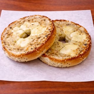 BAGEL TOASTED WITH BUTTER OR CREAM CHEESE