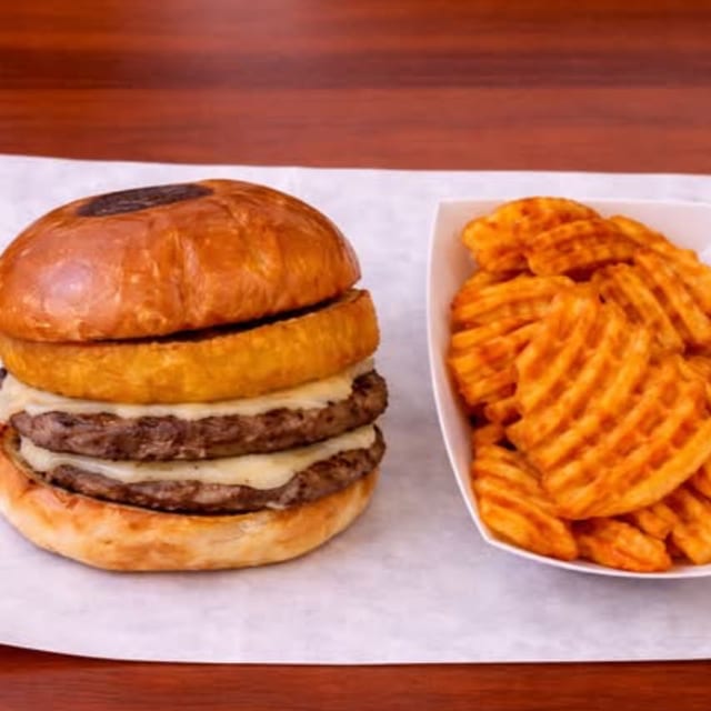 CHIPOTLE JALAPENO BURGER WITH FRIES.